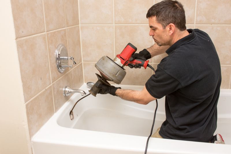Plumber working on bathroom remodel